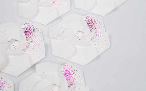 Sparkling origami-inspired invitation by Conduit Studio