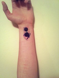 behind-my-ocean-eyes:  My wonderful watercolor semicolon tattoo….stupid cell phone quality…