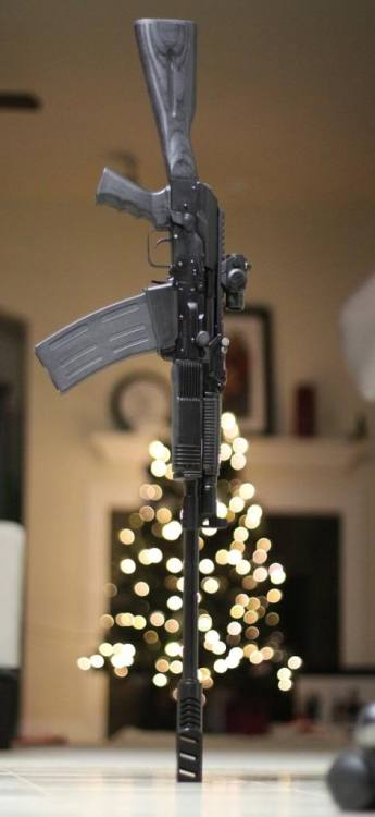 gunrunnerhell:  Shotgun Stand A Vepr 12 with the GK-01 Muzzle Brake. Apparently it’s wide enough to balance the entire shotgun vertically. There are genuine Russian made GK-01’s and now U.S made copies. Generally you only see the GK-01 installed on