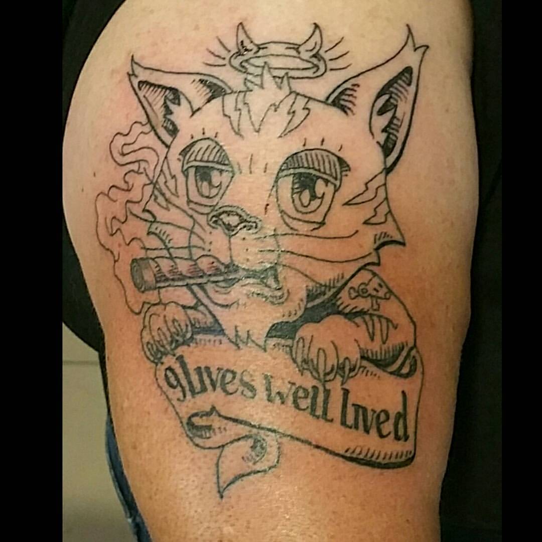 Nine Lives Tattoo