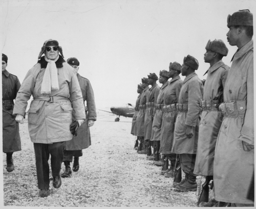 todaysdocument:General of the Army Douglas MacArthur is shown inspecting troops of the 24th Infantry