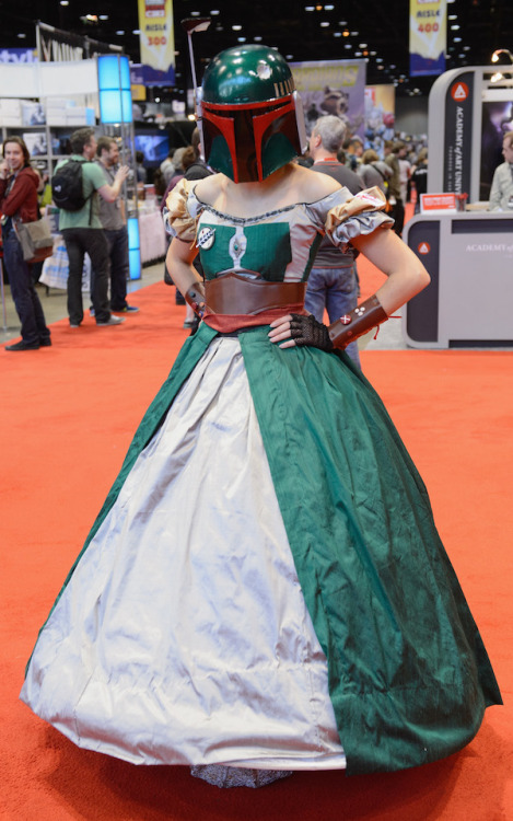 kamikame-cosplay:  Awesome Bobba Fett ball gown, Photo by New Now Next. Who knew Boba Fett was so crafty! I love how tastefully all the aspects of his classic costume have been incorporated into her cosplay, right down to what I presume is a wookie scalp