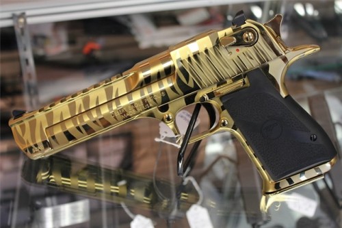 gunrunnerhell:Desert Eagle Mark XIXThe gold tiger stripe finish is one of the options available to t