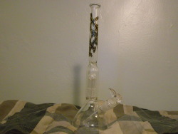 Figured it was about time to graduate to a real bong. MN Legit piece with a thin shaft and percolators on the body   downstem.  Should be smooooth. &lt;3