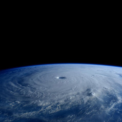 ohstarstuff:  Super Typhoon MaysakItalian astronaut Samantha Cristoforetti and NASA astronaut Terry Virts aboard the International Space Station recently captured these incredible images of Super Typhoon Maysak. As it has moved over the Pacific Ocean,