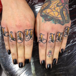 thievinggenius:  Finger tattoos done by Cody