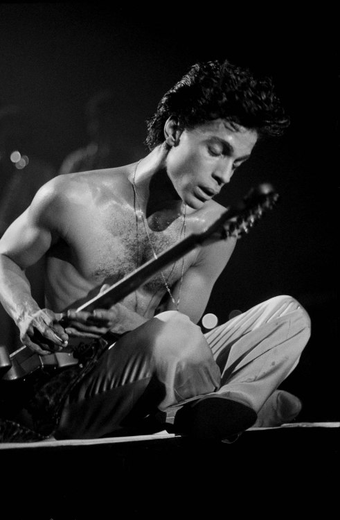 milkandheavysugar:Prince performs onstage during a pre-tour concert at the Wiltern Theatre, Los Angeles, California, May 30, 1986