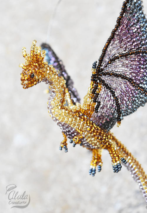 sosuperawesome:Beaded Dragon and Bird Suncatchers, by Alula Creations on EtsySee our ‘suncatchers’ tag