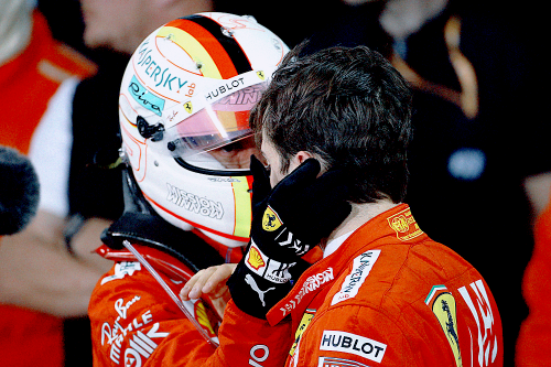 pinsaroulettes:BAHRAIN, BAHRAIN - MARCH 31, 2019: Sebastian Vettel consoles third placed finisher Ch