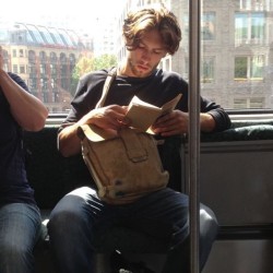 tendertime:“Spotted this scruffy prince on his morning commute. Probably to sculpture class. I’m sure he’s reading a collection of post-war Russian short stories, but really thinking of how he made love to his French girlfriend this morning and