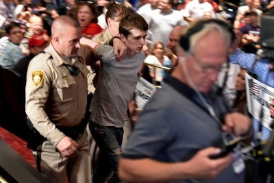 the-lianking:  tombruise:  congenitaldisease:  19-year-old Michael Sandford, a British man living in the U.S., was arrested on 19 June, 2016, after attempting to steal a gun from an officer while attending a    Donald Trump   rally. He explained that