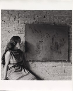 inneroptics:  Yoko Ono with her Painting to See in the Dark (Version 1), 1961-  George Maciunas’  