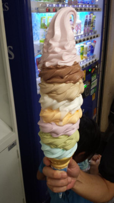 cellphood:  Daily Chico in Nakano Broadway serves ice cream of a wide variety of flavors, including this Mammoth Ice Cream that contains Tochi Otome strawberry, chocolate, mocha, vanilla, melon, grape, matcha green tea, and ramune flavors, all in one