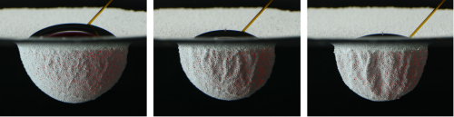 fuckyeahfluiddynamics:  A thin layer of hydrophobic particles dispersed at an oil-water interface is strong enough to prevent a water droplet from coalescing. The researchers refer to this set-up as their granular raft. As the red-dyed water droplet gets