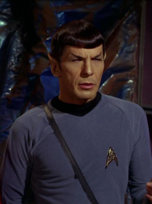 Oh look, Spock sports his purse - ahem, tricorder - with the strap cross-body just like me! Just kid