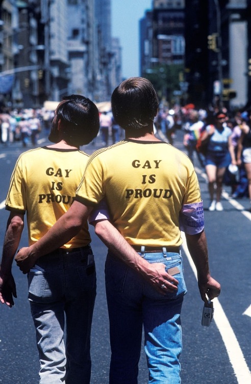 vintageeveryday:A couple wearing ‘Gay is Proud’ t-shirts at a Gay Pride march, New York, 1970s. Phot