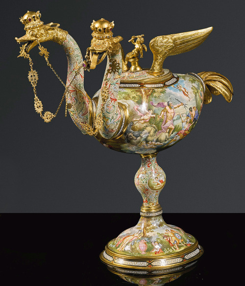 cgmfindings:  silver-gilt two-headed ostrich cupRudolf Linke, Vienna 1900 On a circular base, the body painted with Jupiter’s wrath and Elysian nuptials, detachable cover with silver-gilt wings and putto finial, the ostrich heads surmounted by jewelled