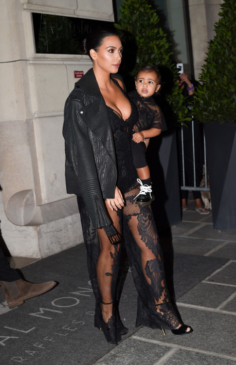 kxrdashjenner:  09/28/14 - Kim Kardashian and North West leaving their hotel and heading to the Givenchy SS15 show in Paris, France.   😍
