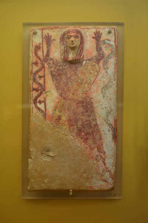 greek-museums:Archaeological Museum of the Stoa of Attalos:A shield and a plaque with a female figur