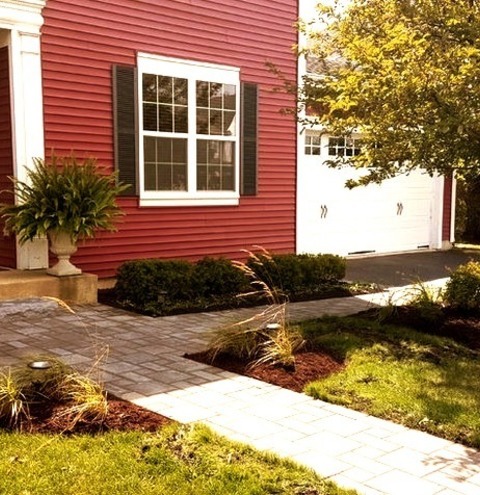 Brick Pavers Front Yard ChicagoPhoto Of A Mid-sized Traditional Front Yard Brick Landscaping.