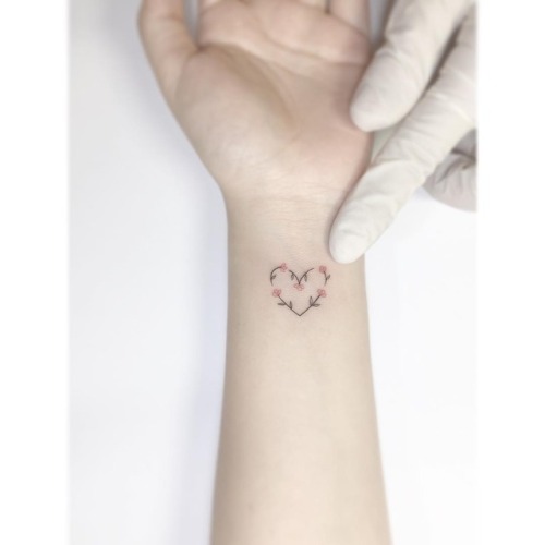 attirant-tattoos: playground_tat2 Heart flower.