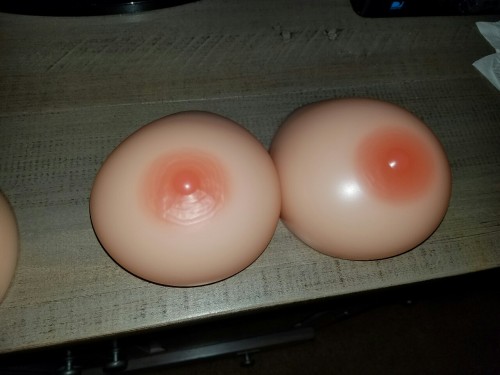 The ones in plastic and on the left are my old ones They have a rip in it so i ordered new breast forms and they just came in and there bigger  Im so happy  Sissy peches 😊😊😊😊😊