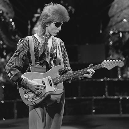 guerrillaoperator:  David Bowie shooting the video for “Rebel Rebel” on TopPop, ‘74.