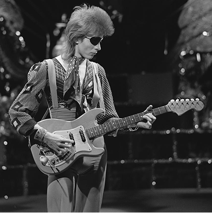 guerrillaoperator:  David Bowie shooting the video for “Rebel Rebel” on TopPop, ‘74. 