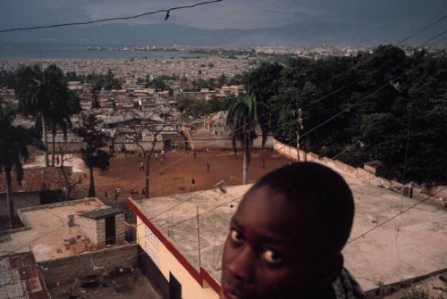 ouilavie: Alex Webb. Port au Prince. Haiti. 2000. Storm light over the city.