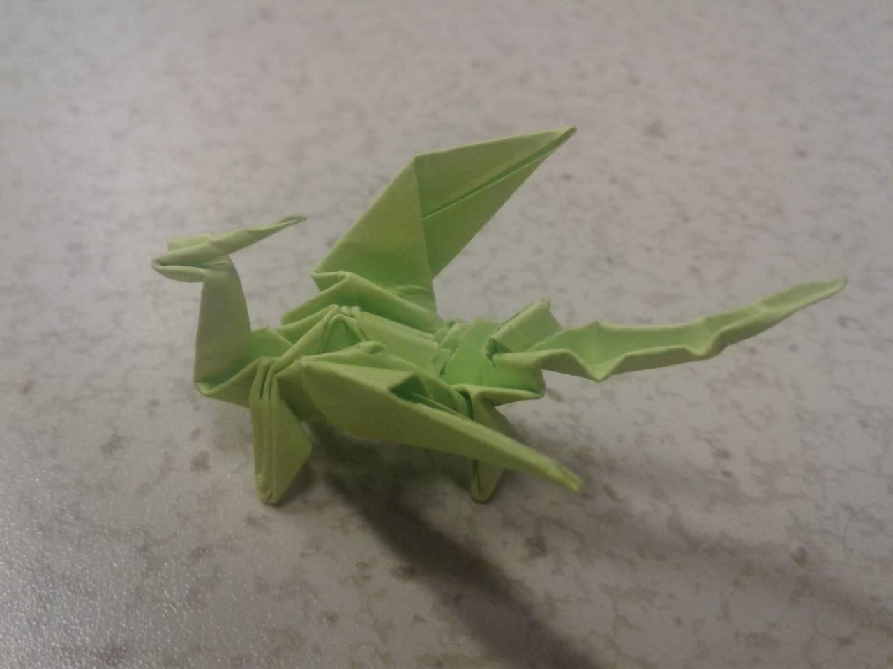 randomencounters: xensilverquill:   so i walked into the lab today and i did a double take because i saw a friend a tiny friend a tiny origiami dragon friend TINY GOOD GREEN BOI!!   Encounter: an extremely small Green Dragon 