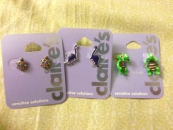 withmyheartwideopen:  spanklove:  Daddy bought me earrings today!!  Sweets and Mally!  those dinosaurs!