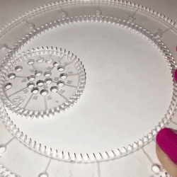 love-is-for-the-foolish:  sixpenceee:  Watching someone create this spirograph rainbow is so mesmerizing.   One of my favorite things growing up 