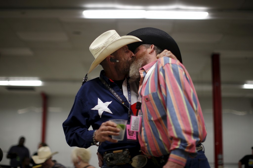 enoughtohold:Gordon Satterly, 61, from Michigan (L) kisses his husband Richard Brand,