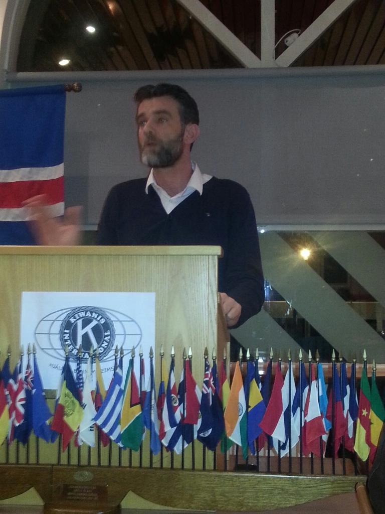 Stefán Karl giving a speech about Rainbow Children for Kiwanis Club KATLA