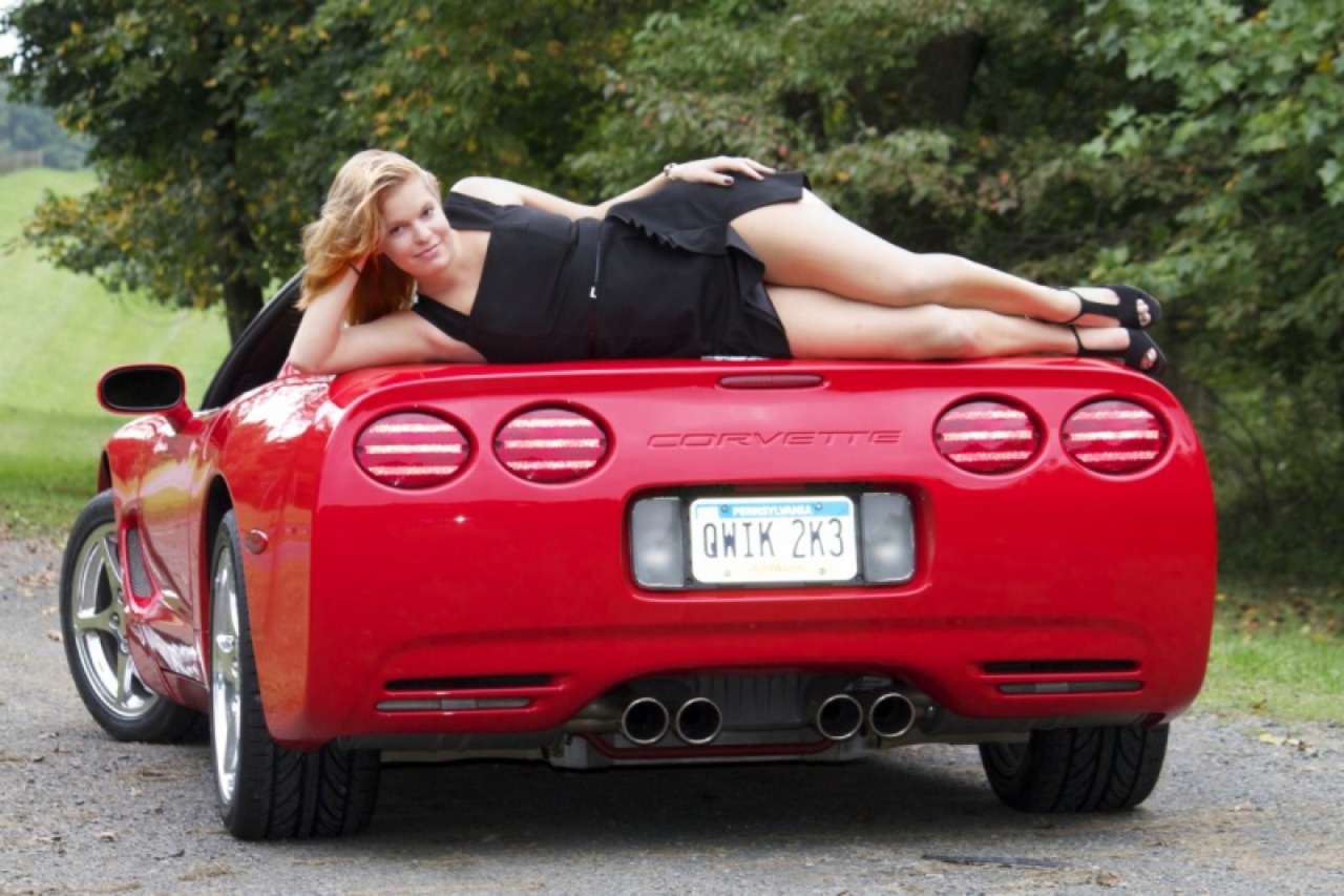 Chicks posing on cars