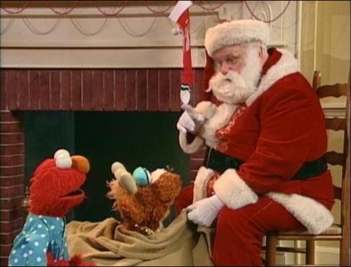 Elmo Saves Christmas (1996) - Charles Durning as Santa ClausThe beard looks way too fake here, but i