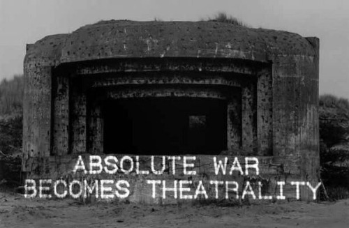 robertodurangutierrez:  1998 · Laser projection of Paul Virilio’s Bunker Archaeology quotes on the remains of the Atlantic Wall · Magdalena Jetelova