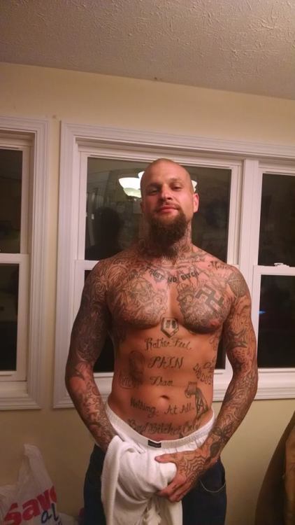 ngrboy4whttops:  When He saw my reaction to His tattoos when He took His shirt off, He smirked and nodded because He knew that i knew that my black ass would become His property.  Yum