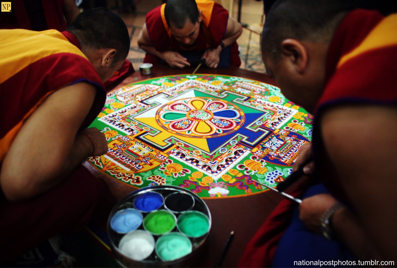 nationalpostphotos:  Colorful sand mandala — Tibetan Monks from the Tashi Lhunpo