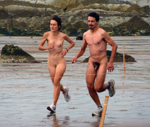 Jogging along the beach  adult photos