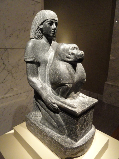 Granodiorite statue of a man named Minemheb, accompanied by a baboon representing Thoth.  Artist unk