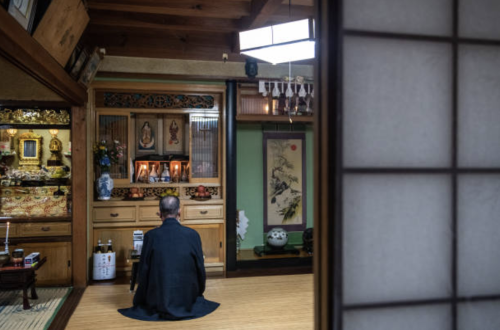 Masaichi Kawasaki, whose grandfather was converted to Catholicism by hidden Christians, prays at his