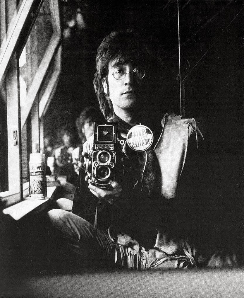John Lennon
Self Portrait of John Lennon and his Rolleiflex in the attic of his house Kenwood, June 29, 1967.