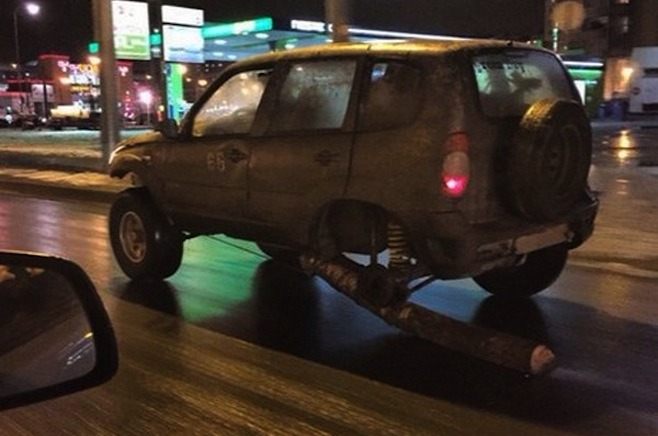 Russian Driver Replaces Car Tire With Log | News