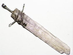 ruleroftwili:  Light Pink Kunzite Crystal Sword (40 ct) Pendant in Sterling i love the sword shape this one has, i want it so badly but it’s ฾   okay but a life size sword would be lit