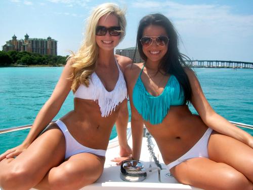 sports-babes:  New Orleans Saints cheerleaders the Saintsations shaking pom poms and rocking bikinis prior to their NFL playoff showdown with the Seahawks.  2 persons I would love 2 meet
