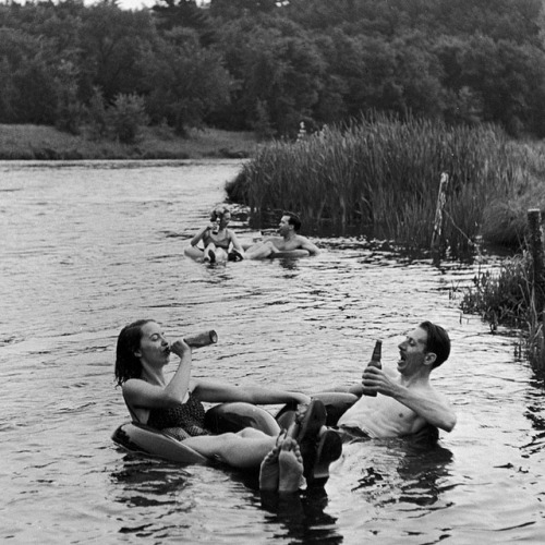 life: It’s National Beer Day in the U.S.! LIFE is celebrating with this photo by the great Alfred Eisenstaedt of couples drinking beer and enjoying a tube floating party on the Apple River in Wisconsin in 1941. (Alfred Eisenstaedt—The LIFE Picture