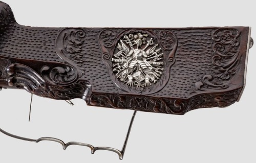 Magnificently carved and engraved wheel-lock rifle from Bohemia, dated 1662.from Hermann Historica