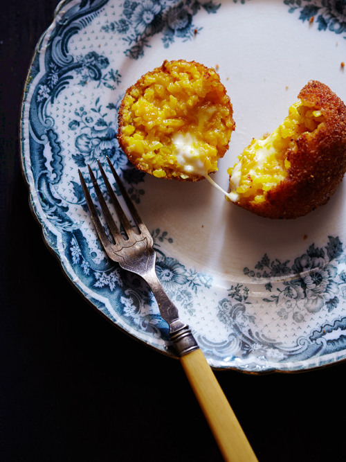 Arancini (makes 10-12)   leftover Risotto Milanese (up to 3 days old) 1 block of Melville zest 