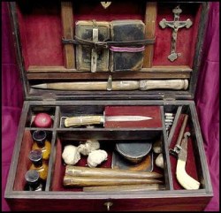 odditiesoflife:  Real Vintage Vampire Killing Kit A complete and authentic vampire killing kit — made around 1800 and complete with stakes, mirrors, a gun with silver bullets, crosses, a Bible, holy water, candles and even garlic.  It was sold at an